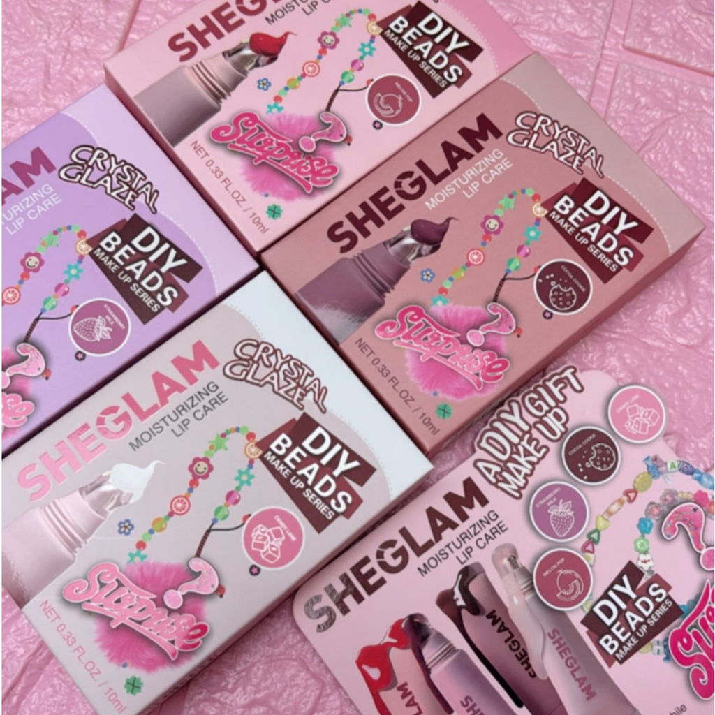 Gloss + llavero tipo Sheglam
